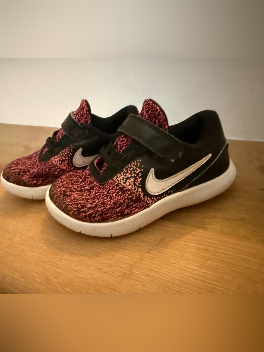 Nike Kids Black and Pink Slip-On Athletic Sneakers